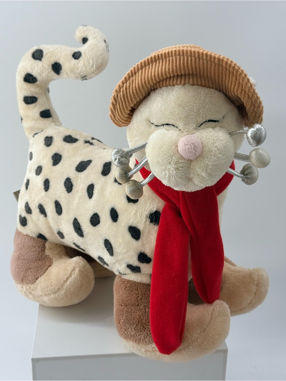 Cream Spotted Plush Cat with Red Scarf and Tan Corduroy Hat